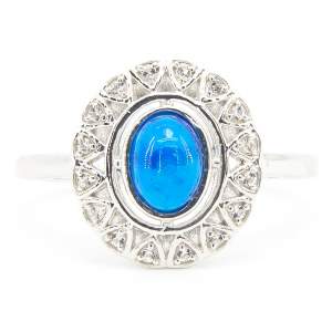 Срібна каблучка 925 проби 3,53 г з ефіопським блакитним опалом класу AAA та топазами 0,64 карат з колекції Срібна каблучка 925 проби 3,53 г з ефіопським блакитним опалом класу AAA та топазами 0,64 карат з колекції