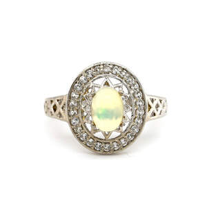 Срібна каблучка 925 проби 3,29 г з ефіопськими опалами класу AAA та білими топазами 0,8 карат