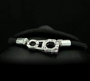 Браслет з срібними вставками 925 проби 14,64 г Браслет з срібними вставками 925 проби 14,64 г