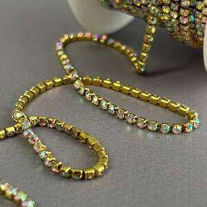 1м - Стразовая цепь SS6 (2мм), Кристал с покрытием АВ золото 1м - Стразовая цепь SS6 (2мм), Кристал с покрытием АВ золото