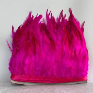 50 см - Перья петуха на ленте 8-12 см - малиновый