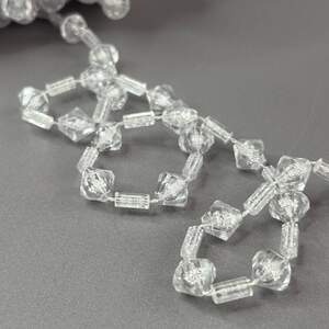 Бусины на нитке 11 мм кристалы биконус - прозрачный