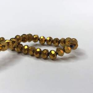 Бусины хрустальные рондель 4х3мм, нить-130 шт, темное золотое напыление