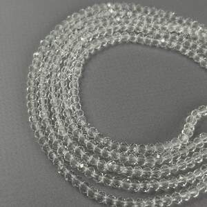 Бусины хрустальные рондель 4х3мм, нить-135 шт, прозрачный