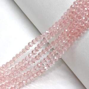 Бусины хрустальные рондель 4х3мм, нить-135 шт, розовый прозрачный