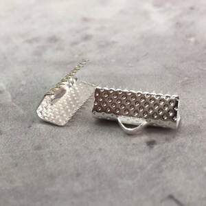 Зажим для лент и шнура 16 мм, уп 10 шт - светлое серебро Зажим для лент и шнура 16 мм, уп 10 шт - светлое серебро