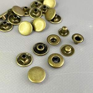 Кнопка нержавейка Альфа - 15мм Антик (50шт) (00247) Кнопка нержавейка Альфа - 15мм Антик (50шт) (00247)