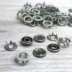 Кнопка трикотажная Baby 9,5мм Бежевая с зеленцой (50шт.) (212223) Кнопка трикотажная Baby 9,5мм Бежевая с зеленцой (50шт.) (212223)