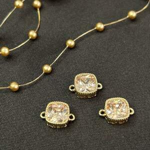 Коннектор с фианитами 7х10мм, позолота 18К лимонный цвет Коннектор с фианитами 7х10мм, позолота 18К лимонный цвет