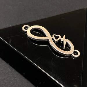 Коннектор-разделитель Бесконечность 11х33 мм, цвет Сталь Коннектор-разделитель Бесконечность 11х33 мм, цвет Сталь