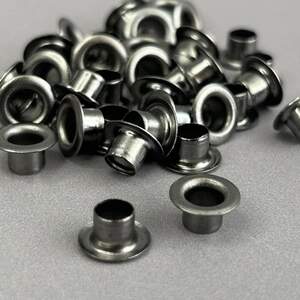 Люверс D-5мм нерж. с пласт. кольцом-темный никель (100шт) (матр.00254)