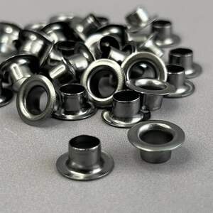 Люверс D-6мм нерж. с пласт. кольцом-темный никель (100шт) (матр.00255)