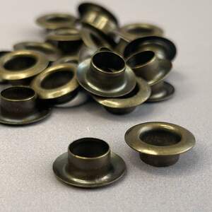 Люверс D-8мм нерж. с пласт. кольцом-антик (100шт) (матр.00256)