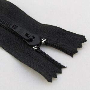 Молния Т-3 18см Юбка (100шт) Черная Молния Т-3 18см Юбка (100шт) Черная