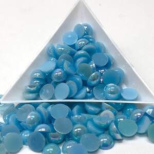 Полубусины перламутровые 8мм, 10 гр/уп - цвет голубой #12 с АВ покрытием Полубусины перламутровые 8мм, 10 гр/уп - цвет голубой #12 с АВ покрытием