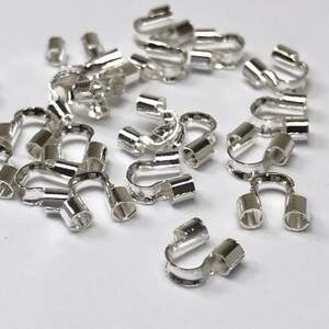 Протектор для тросика 5 мм - 3г/уп - светлое серебро Протектор для тросика 5 мм - 3г/уп - светлое серебро