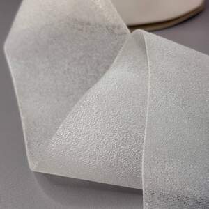 Тесьма клеевая для штор под люверсы, 10 см - полупрозрачная